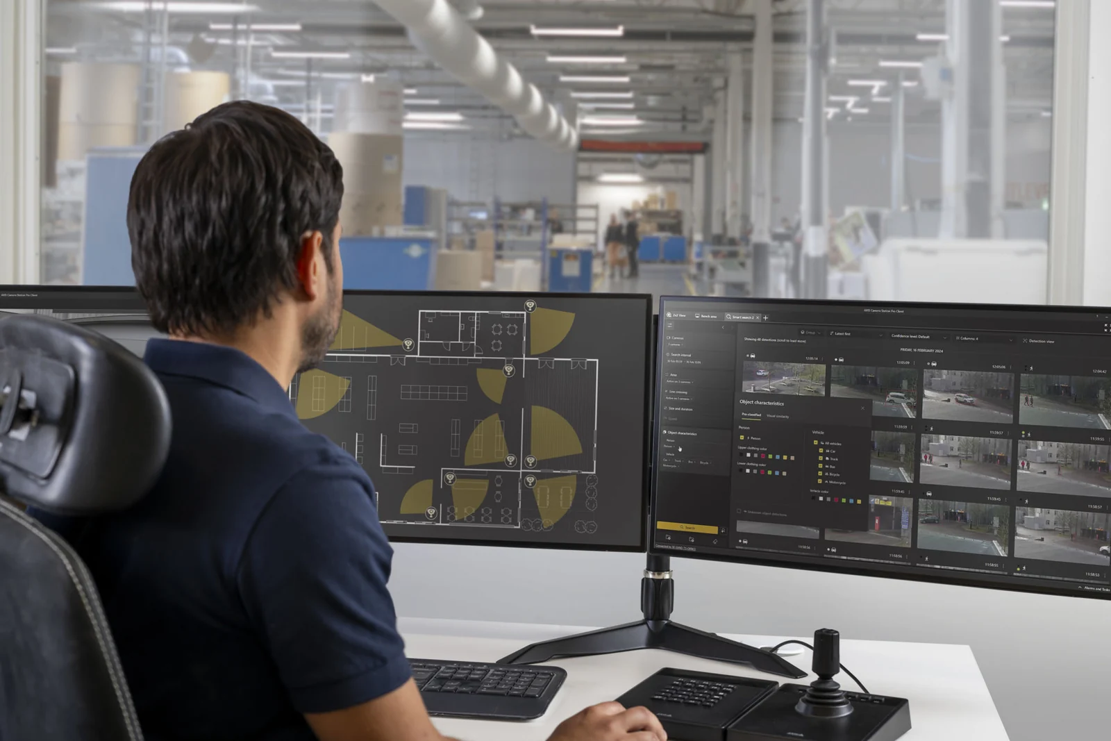 Security operator viewing monitoring screens